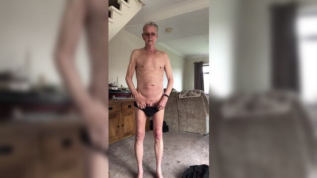 Old man strips naked