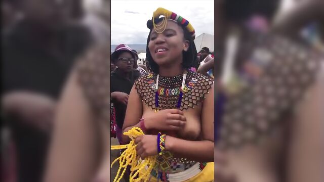 Busty South African girls singing and dancing topless