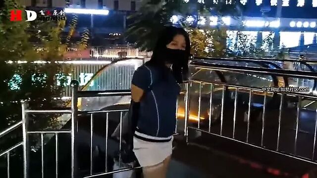 Bondage and armbinder in public