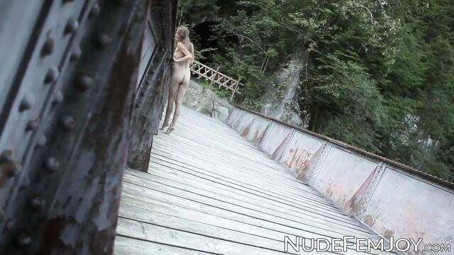 Tall lass naked in the outdoors seduces you with her hips